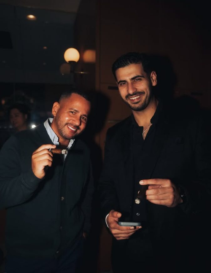 Members in good company with cigars